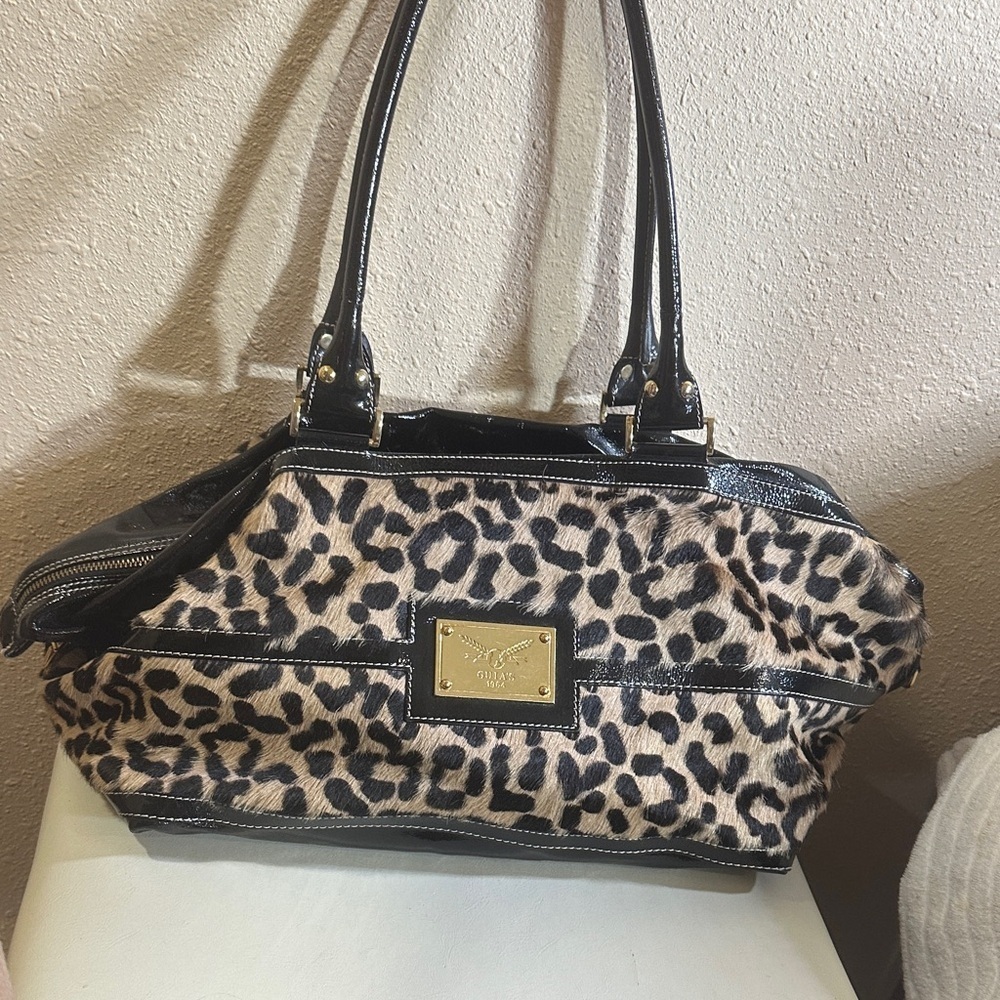 Guia’s 1964 Leopard print Shoulder Duffle